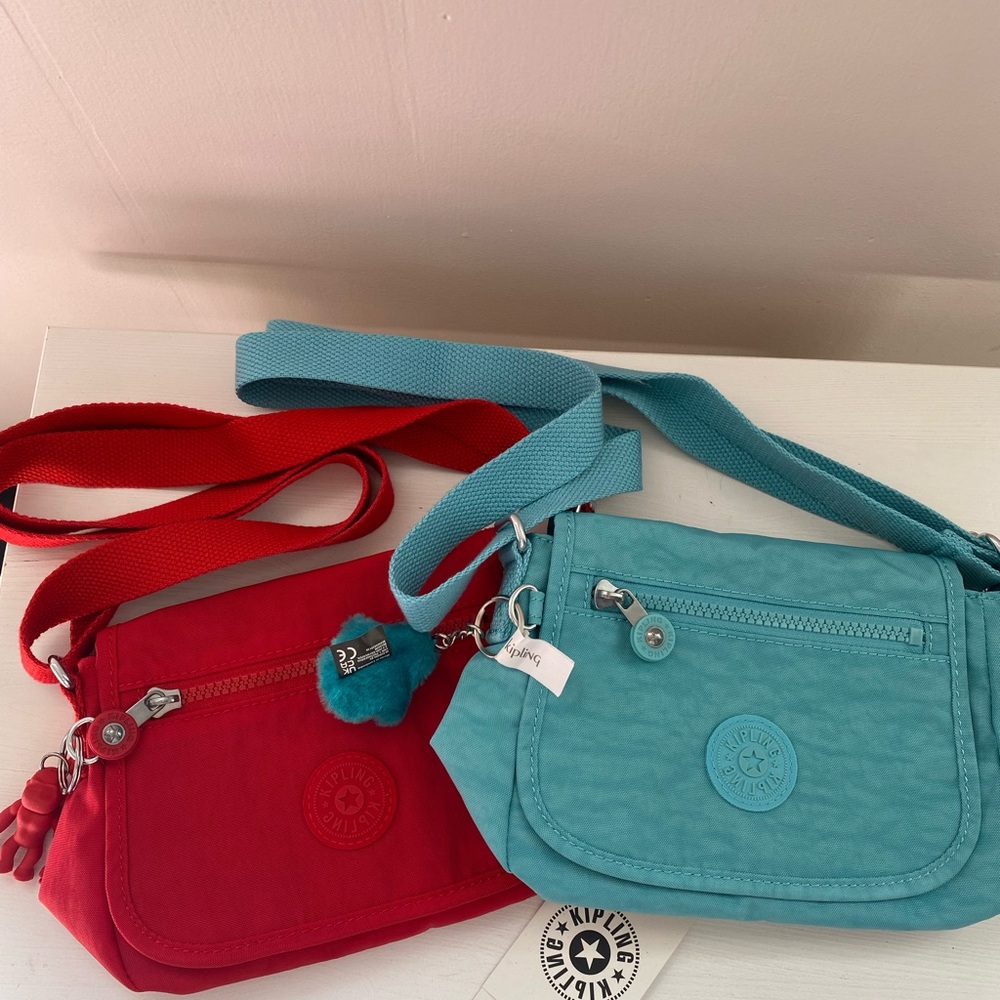 Kipling KIPLING
Sabian Mini Crossbody. COLOR: CHERRY/SILVER or DEEPSTAQUA